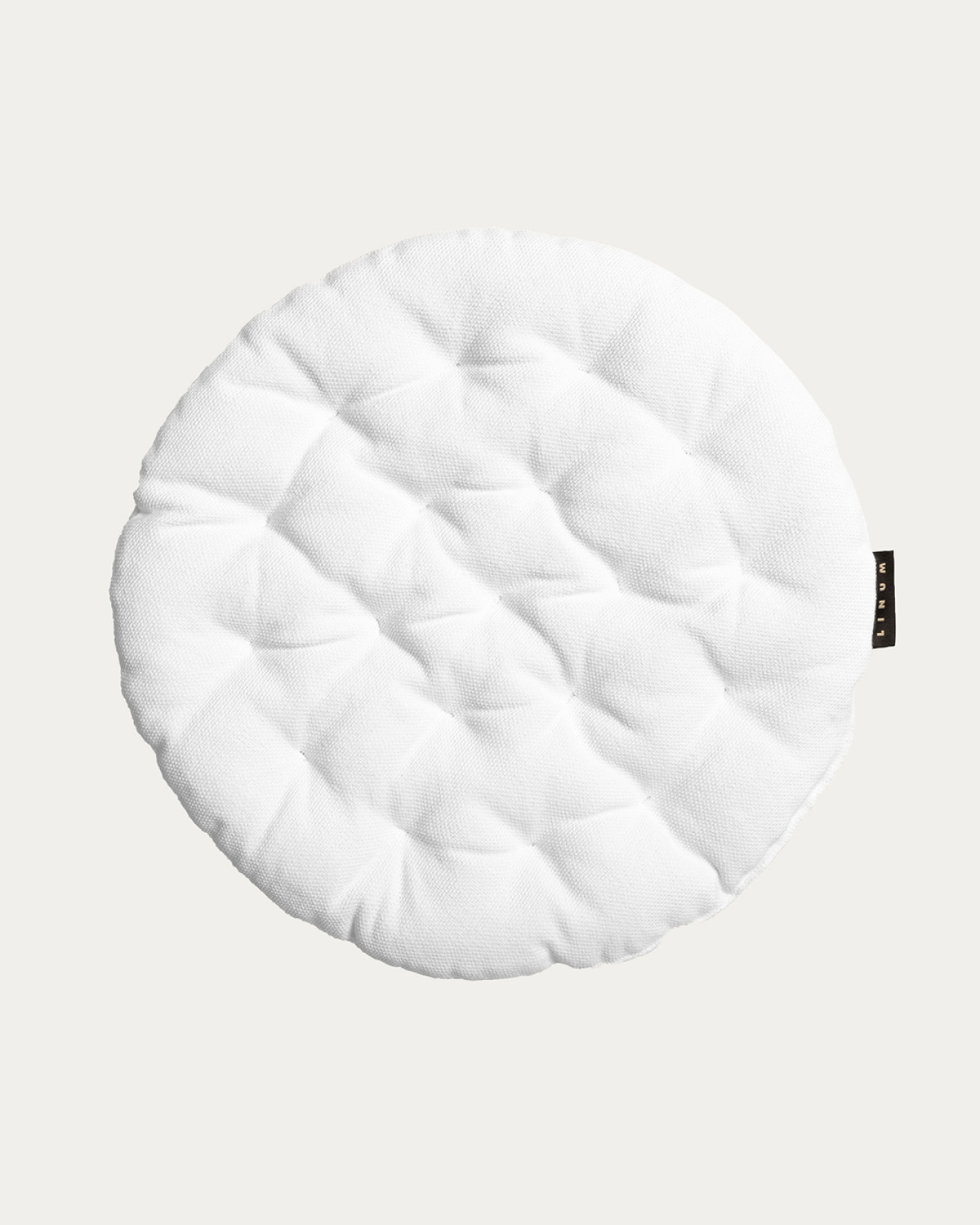 Produktbild vit PEPPER sittdyna av mjuk bomull med återvunnen polyesterfyllning från LINUM DESIGN. Storlek ø37 cm.